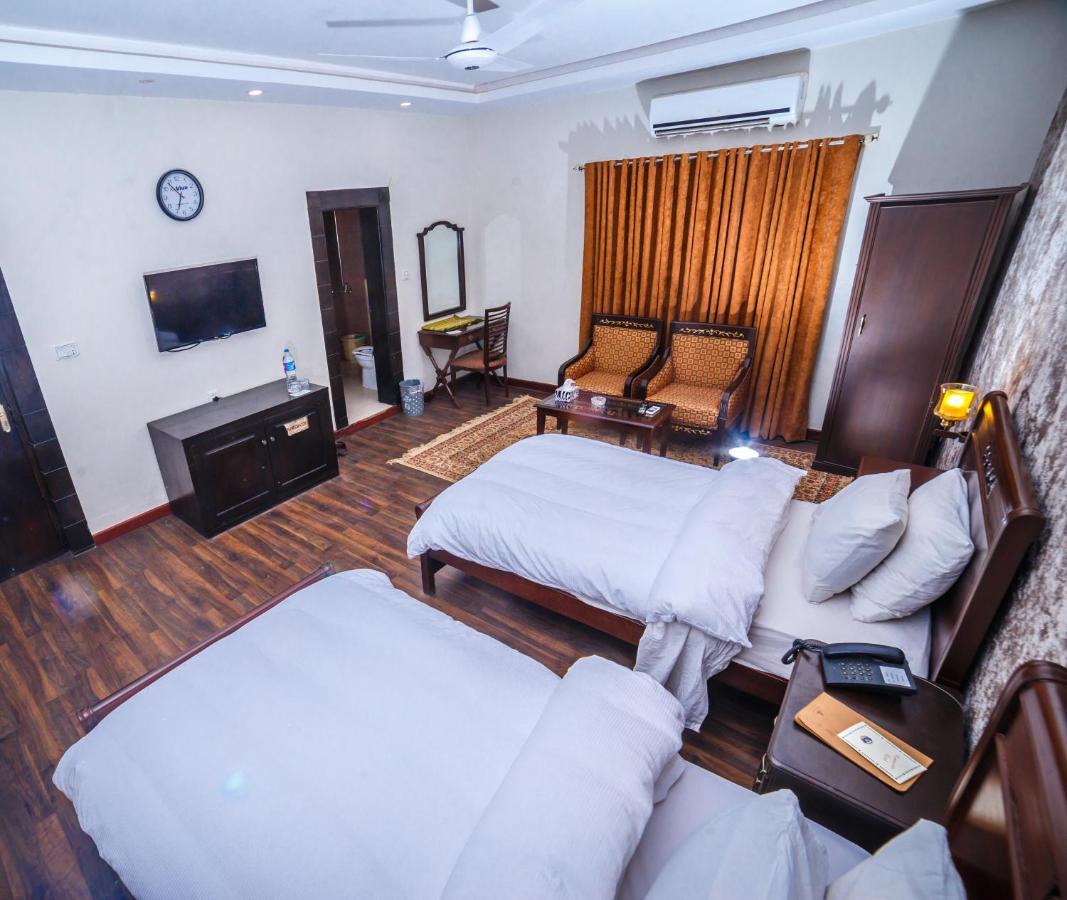 Vip House Hotel Пешавар Екстериор снимка