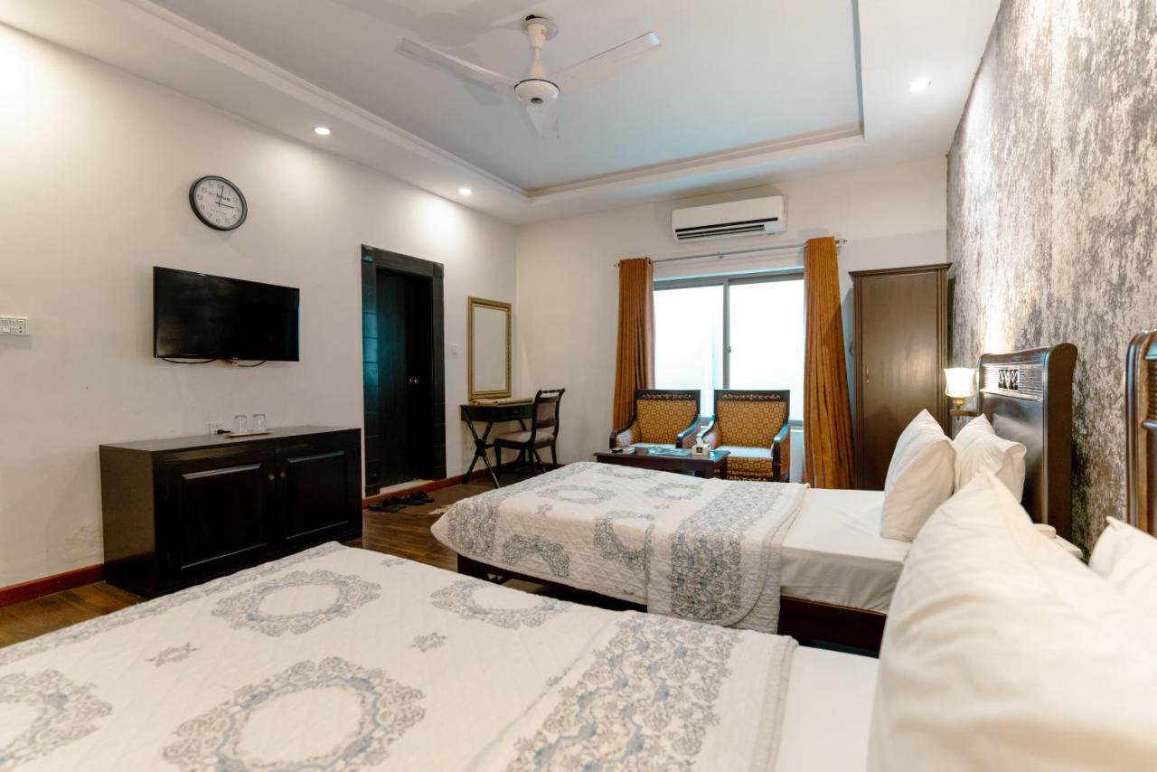 Vip House Hotel Пешавар Екстериор снимка
