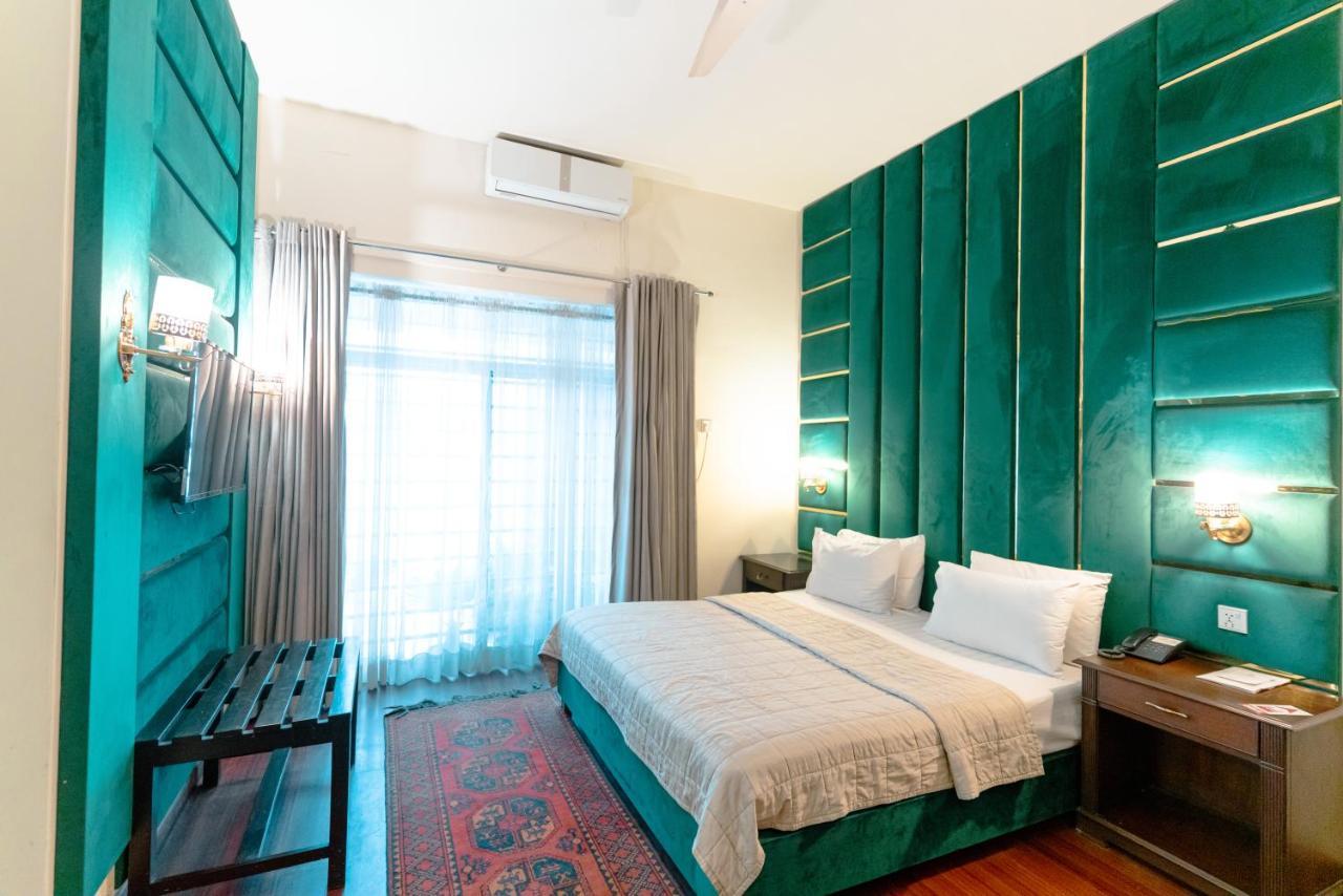 Vip House Hotel Пешавар Екстериор снимка